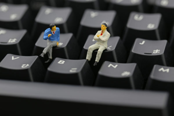 Figurines on Keyboard